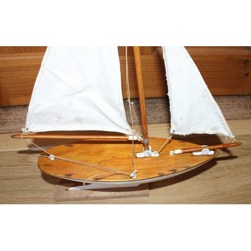 8 - Small Wooden Yacht On Stand
Length-31cm