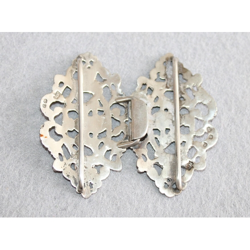 553 - Pair of Silver Hallmarked Belt Buckles
Length-6cm Each