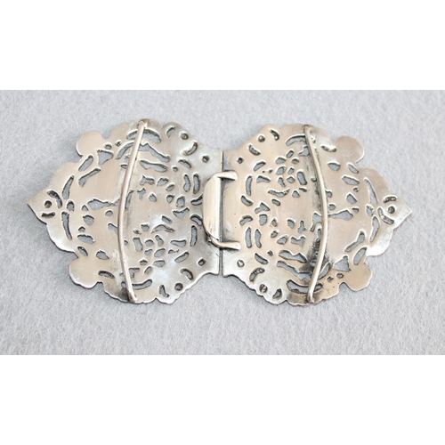 554 - Pair of Silver Belt Buckles
Length-6.5cm Each