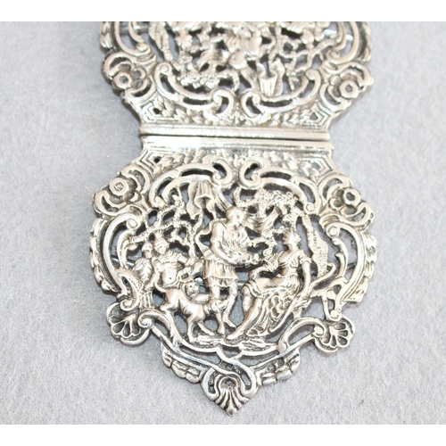 554 - Pair of Silver Belt Buckles
Length-6.5cm Each