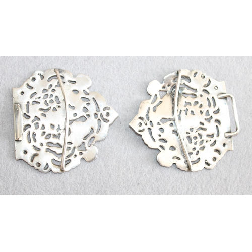 554 - Pair of Silver Belt Buckles
Length-6.5cm Each