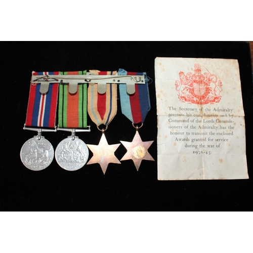 129 - WWII Group of Four Medals with Entitlement Slip.

British War, Defence, 1939-45 and Africa Star Meda... 