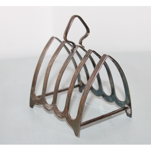 587 - Silver Hallmarked Toast Rack
Width-8cm
Height-6.5cm