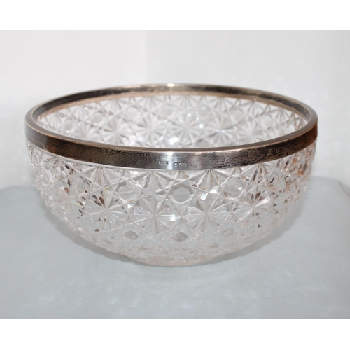 590 - Large Silver Hallmarked Rimmed Crystal Bowl
Dimensions-24 x 24cm