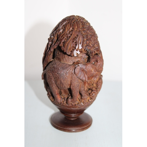 38 - Wooden Carved Egg Shaped Elephant Scene Ornament Signed Gibson 95
Height-14cm