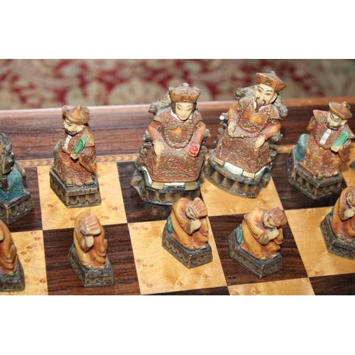 747 - Wooden Chess Table & Resin Players
Height-47.5cm
Table Top 59x59cm
Collection Only