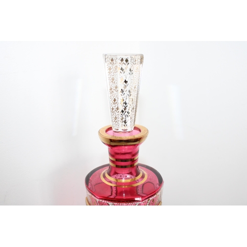 719 - Decorative Cranberry & Gold Glass Decanter 
Height-29.5cm
Some Chips To Lid As Shown In Pictures
All... 