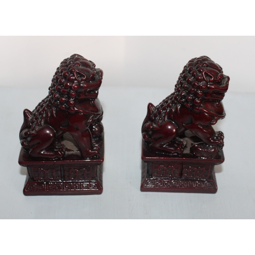 724 - Two Oriental Foo Dog Ornament's
Height-10.5cm