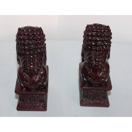 724 - Two Oriental Foo Dog Ornament's
Height-10.5cm