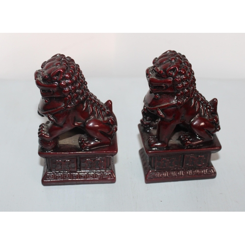 724 - Two Oriental Foo Dog Ornament's
Height-10.5cm