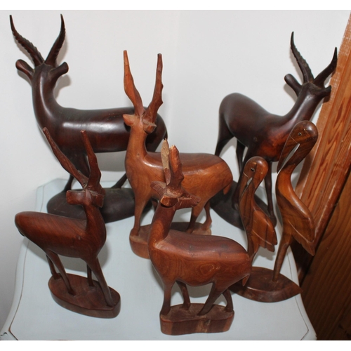 95 - Collection Of Carved Wooden Animals
Tallest-32.5cm

Chipped on One set of ears
 All Proceeds Go To C... 