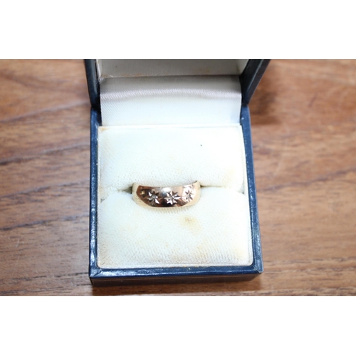 658 - 9ct Gold Three Stone Gypsy Band
Size-L
Weight 3.4gms
In A Box