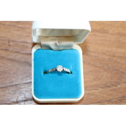 662 - 18ct Gold and Platinum Engagement Ring with 0.5 Carat Diamond ( approx)
Size-L

In A Box