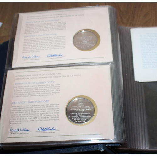 406 - International Society Of Postmasters Coins Sterling Silver
Containing Six Coins In Folder