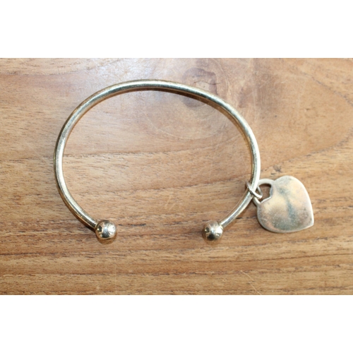 639 - 925 Silver Bangle & Heart
Adult Size