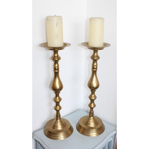 98 - Two Tall Brass Candlestick Holders
Height-51cm