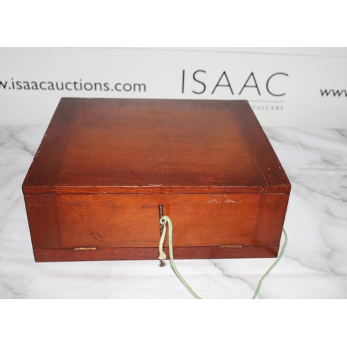 282 - Wooden Collectors Coin Case with Key. 

Includes 6 trays of various coin sizes

Lid has slight damag... 