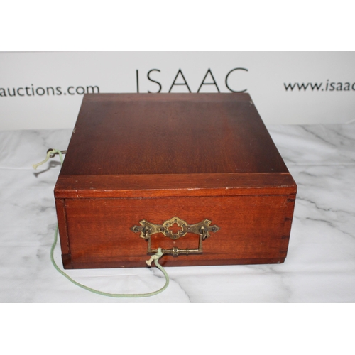 282 - Wooden Collectors Coin Case with Key. 

Includes 6 trays of various coin sizes

Lid has slight damag... 