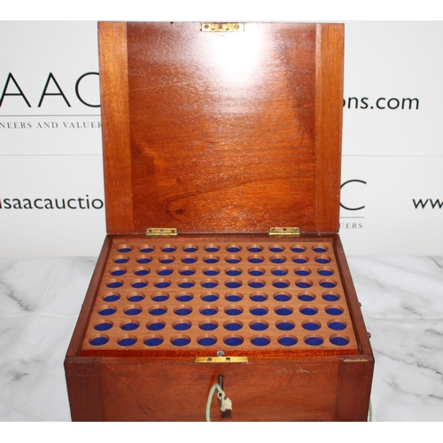 282 - Wooden Collectors Coin Case with Key. 

Includes 6 trays of various coin sizes

Lid has slight damag... 