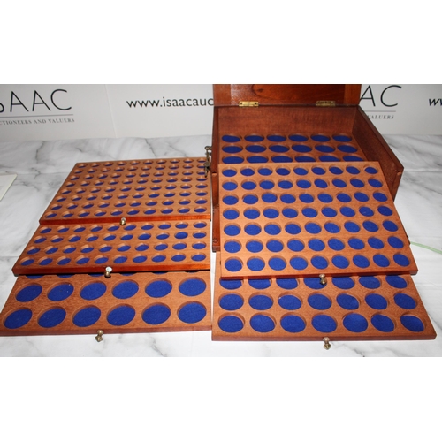 282 - Wooden Collectors Coin Case with Key. 

Includes 6 trays of various coin sizes

Lid has slight damag... 