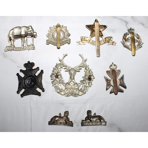 Nine Various Military Badges