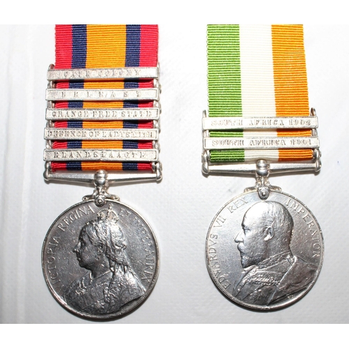 13 - Queens South Africa Medal Pair with 5 Clasps - Defence of Ladysmith

Queens medal inscribed 4128 PTE... 