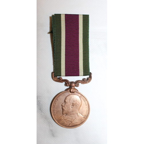 61 - Edward VII Tibet 1903-4 Medal 

Inscription believed to read Cooly Bir Bahindur Rai J & J Corps