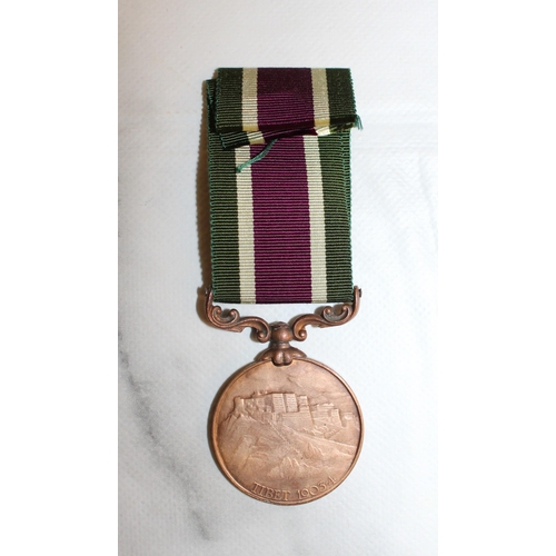 61 - Edward VII Tibet 1903-4 Medal 

Inscription believed to read Cooly Bir Bahindur Rai J & J Corps