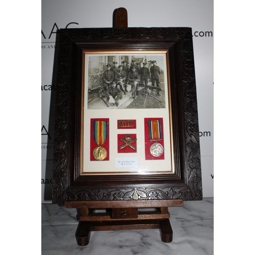 157 - Framed WWI Medals Bertram Sutton - MGC with Badges and Photo
Height-49.5cm
Width-39cm
Collection Onl... 