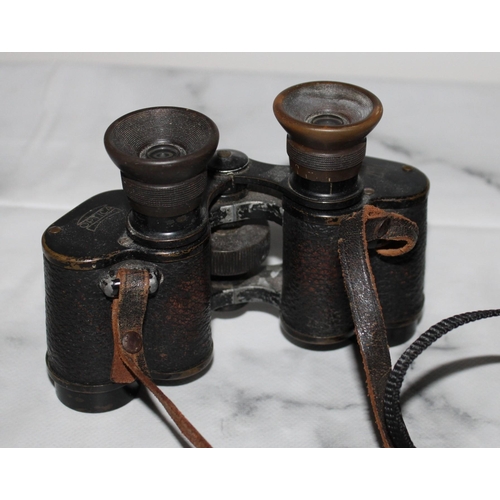 10 - Two Pairs Of Binoculars (Untested)
One Carl Zeiss Jena Multi- Coated Jenopiem 8 x 30 W
One Optica 8 ... 