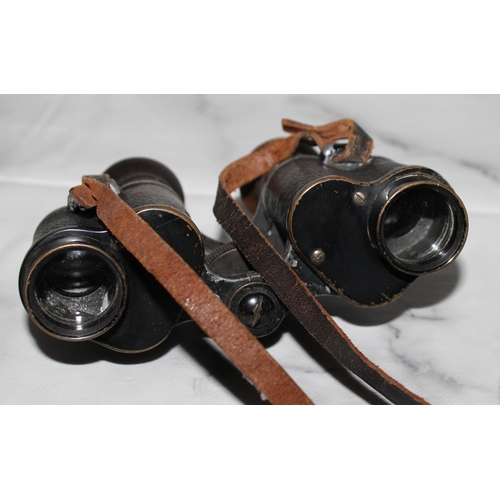 10 - Two Pairs Of Binoculars (Untested)
One Carl Zeiss Jena Multi- Coated Jenopiem 8 x 30 W
One Optica 8 ... 