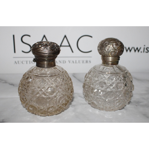 254 - Two Silver Hallmarked Topped Glass Containers
Damage Shown In Photos
Tallest 12cm