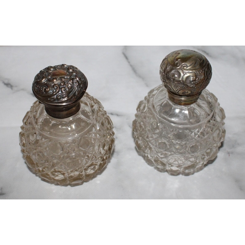 254 - Two Silver Hallmarked Topped Glass Containers
Damage Shown In Photos
Tallest 12cm