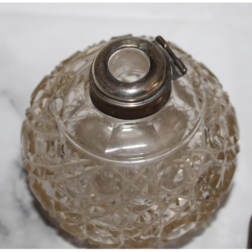 254 - Two Silver Hallmarked Topped Glass Containers
Damage Shown In Photos
Tallest 12cm