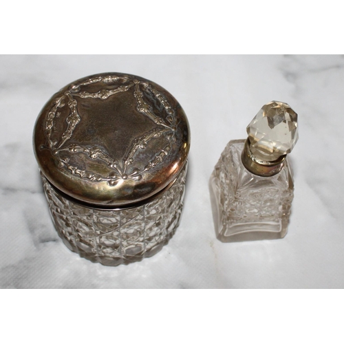 256 - One Silver Hallmarked Rimmed Glass Perfume Container 9cm & One Glass Container With Silver Hallmarke... 