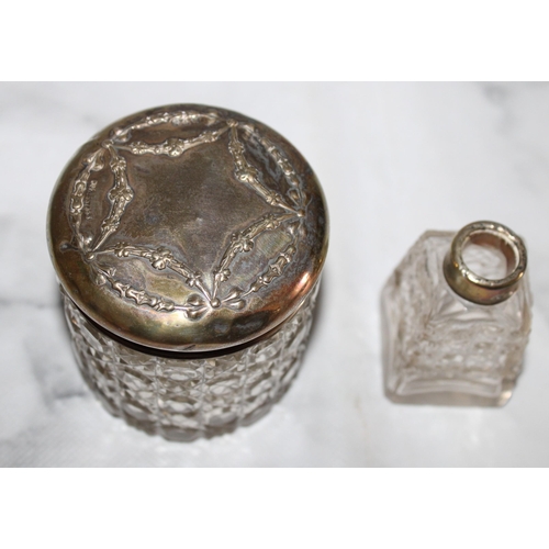 256 - One Silver Hallmarked Rimmed Glass Perfume Container 9cm & One Glass Container With Silver Hallmarke... 