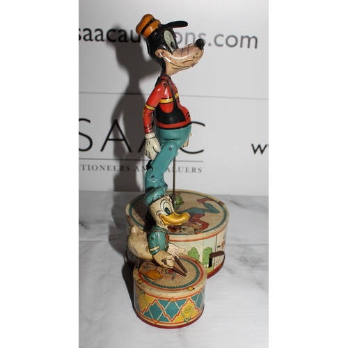 607 - Vintage Tin Wind Up Walt Disney Donald Duck Duet Toy
Height-26.5cm