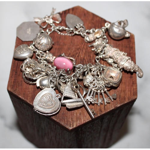 321 - Silver Hallmarked Charm Bracelet & Silver Hallmarked Charms