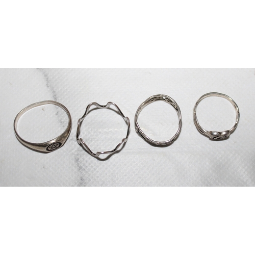 337 - Four Silver Rings
Sizes-S, Q, M, M