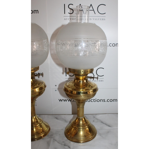 101 - Pair of Brass Oil Lamps with Shades

Standing 55cm Tall

One glass tube missing otherwise good condi... 