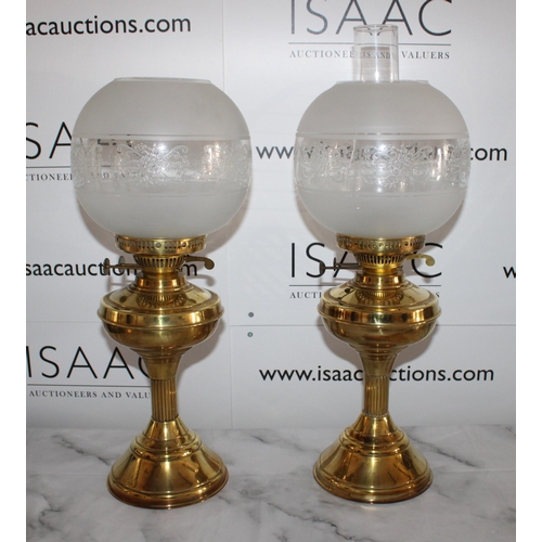 101 - Pair of Brass Oil Lamps with Shades

Standing 55cm Tall

One glass tube missing otherwise good condi... 