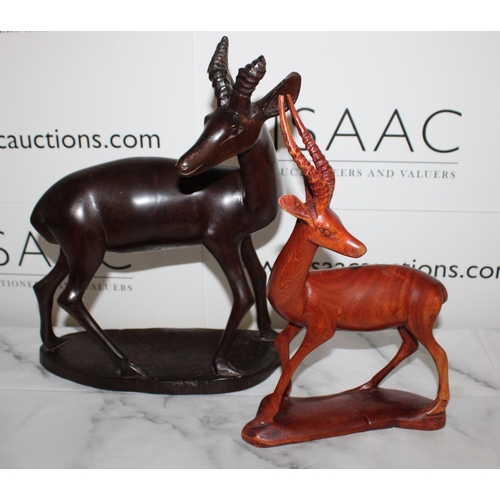 115 - Two African Wooden Antelope Carved Figures

Tallest 36cm