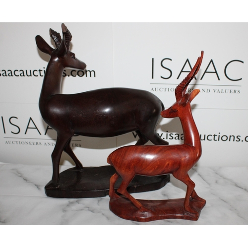 115 - Two African Wooden Antelope Carved Figures

Tallest 36cm