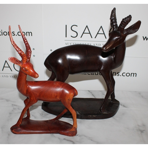 115 - Two African Wooden Antelope Carved Figures

Tallest 36cm