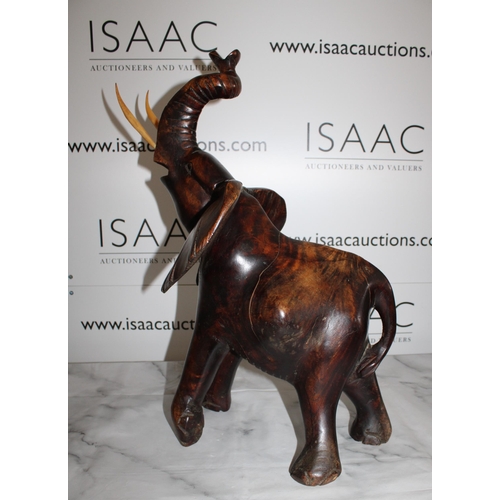 116 - Solid Wooden Carved Elephant - Stands 50cm Tall.

Collection Only.