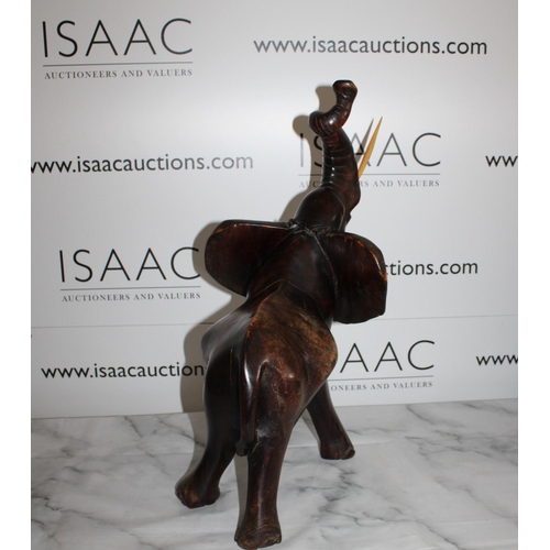 116 - Solid Wooden Carved Elephant - Stands 50cm Tall.

Collection Only.