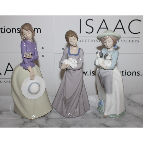 38 - Three Collectable NAO Figurines