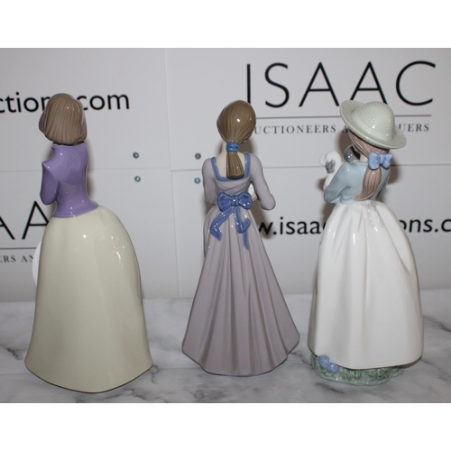 38 - Three Collectable NAO Figurines