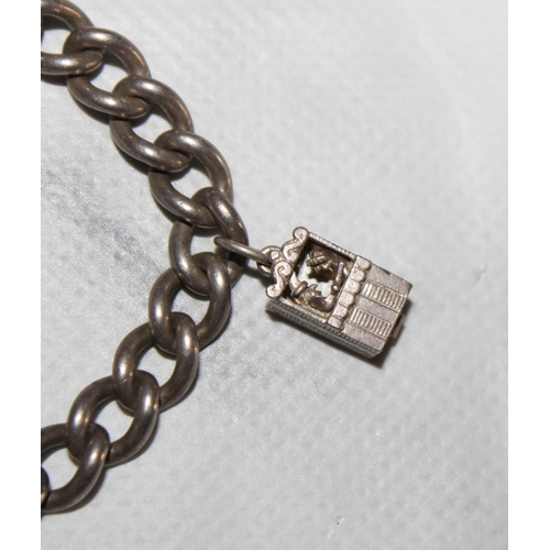 356 - Silver Hallmarked Charm Bracelet with One Punch & Judy Charm
All Proceeds Go To Charity