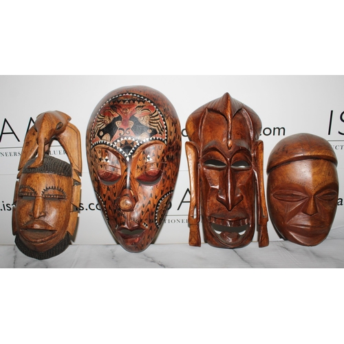 119 - Four Wooden Masks
Tallest-33.5cm